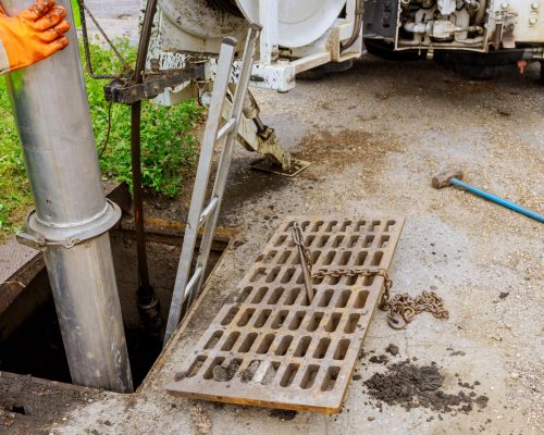Cleaning the sewer system special equipment on utility service in the town.